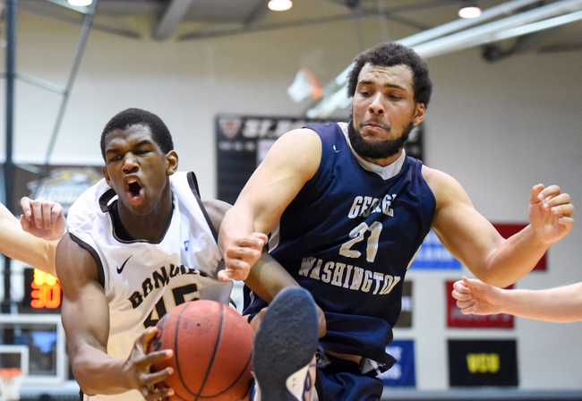 Feb 13, 2016; St. Bonaventure, NY, USA; St. Bonaventure Bonnies forward Jordan Tyson (45) and George Washington Colonials forward Kevin Larsen (21) battle for control of the ball during the second half at the Reilly Center.  St. Bonaventure defeated George Washington 64-57.  Mandatory Credit: Rich Barnes-USA TODAY Sports